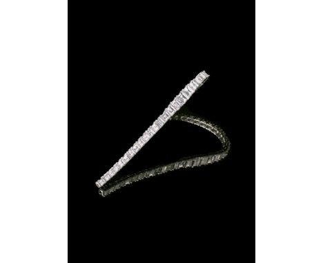 
	
		A DIAMOND BRACELET
		The thirty three graduated step cut diamonds in four claw settings, approximately 23.60 carats tota
