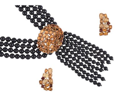 AN ONYX BEAD AND CITRINE NECKLACE AND A SIMILAR PAIR OF CITRINE AND GARNET EAR CLIPSThe necklace with four rows of uniform on
