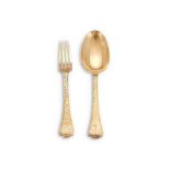 A GERMAN SILVER GILT TREFID PATTERN FORK AND SPOON