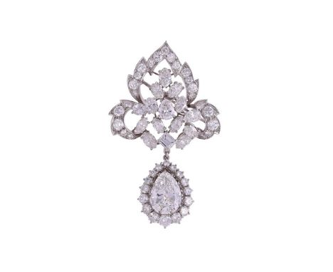 A DIAMOND LEAF SHAPED BROOCH/PENDANT WITH PEAR CUT DIAMOND CLUSTER DROPThe open leaf shaped pediment set with brilliant cut, 