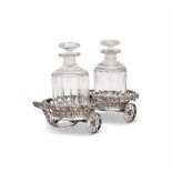 AN ELECTRO-PLATED DECANTER CARRIAGE