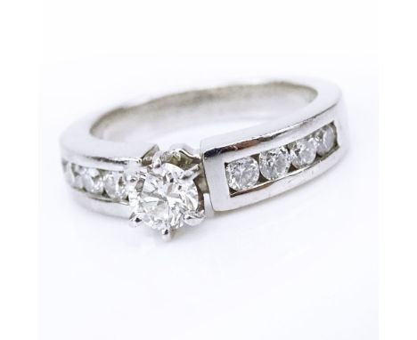 Vintage Approx. 1.25 Diamond and Platinum Engagement Ring set in the Center with an Approx. .30 Carat Round Brilliant Cut Dia