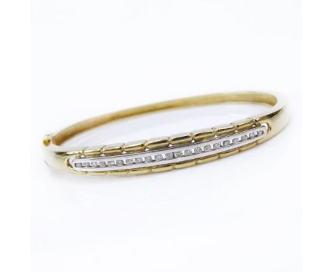 Lady's Vintage 14 Karat Yellow Gold Hinged Bangle Bracelet Accented with Small Round Cut Diamonds. Signed 14K 585. Minor surf