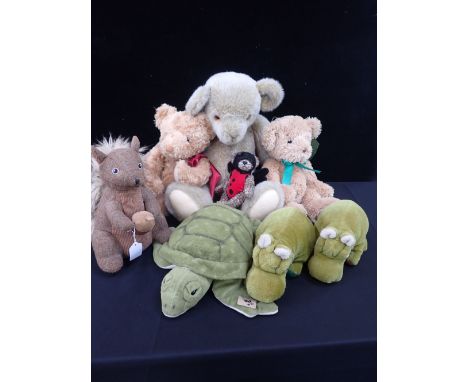 A COLLECTION OF SOFT TOYS including a Harrod's bear, Merrythought Hippos, and a tweedy squirrel doorstop