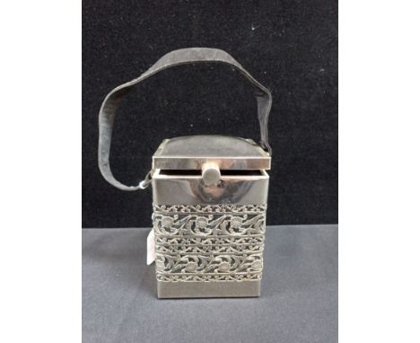 A VINTAGE 'TYROLEAN' OF NEW YORK EVENING BAG OR PURSE of square box form, with pierced rococo metal sides and padded lid 10cm