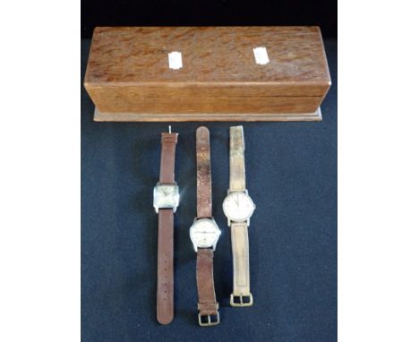 A GENTS RILCONA WRISTWATCH with brown leather strap and two other vintage wristwatches, contained in oak box 