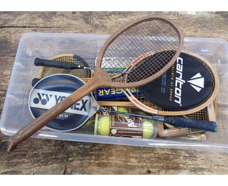 A VINTAGE TENNIS RACQUET, with other modern tennis, squash and badminton racquets