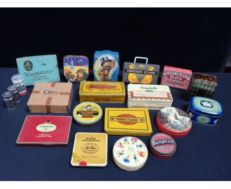 A COLLECTION OF VINTAGE TINS including a Sharp's'spaceman' tin