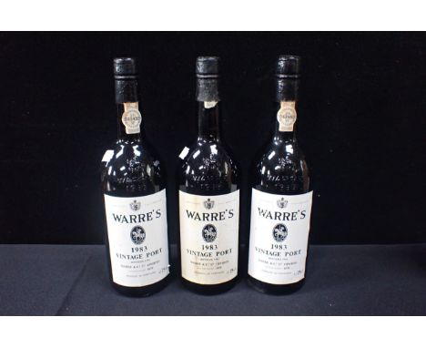 THREE BOTTLES OF WARRE'S 1983 VINTAGE PORT (some label damage)