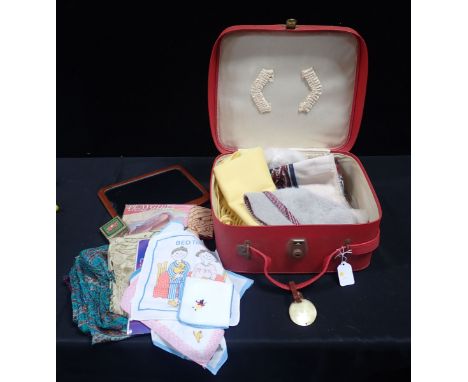 A VINTAGE 1960S CASE WITH CONTENTS including 'playgirl' nylons, headscarves, a hand mirror and other items
