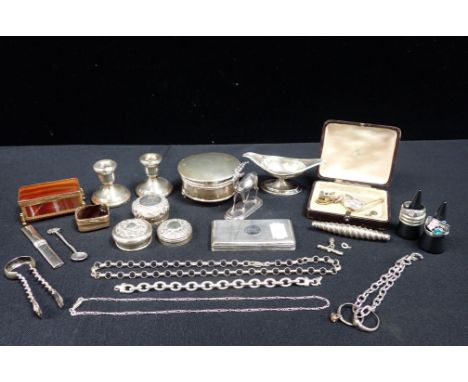 A COLLECTION OF SMALL SILVER and other items, including jar lids,, taper sticks, chains, an antelope menu holder, and a metal