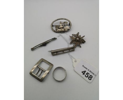 A lot of silver Brooches, silver buckle ring and small silver buckle. 