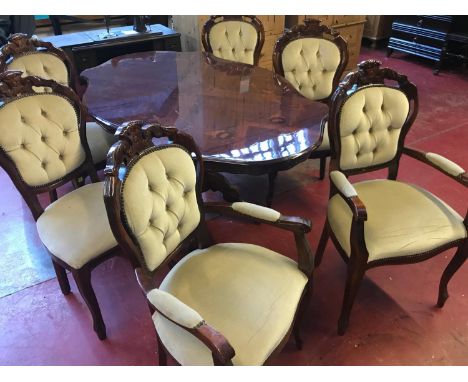 An Italian inlaid dining table. Together with 4 button back chairs and two carvers. Excellent condition. 