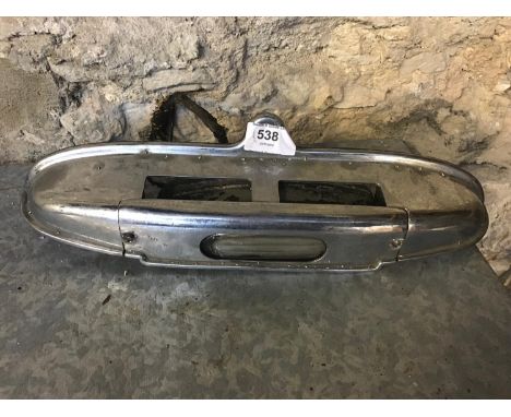 Chrome rear bumper registration light. 