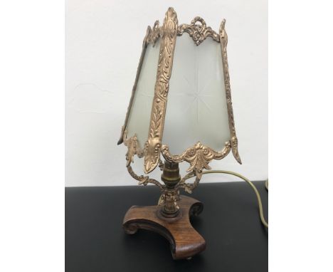 An antique table lamp, in working condition 