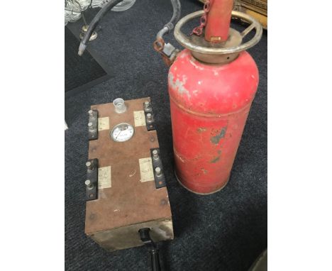 Vintage fire extinguisher and Old wind up volt meter 
