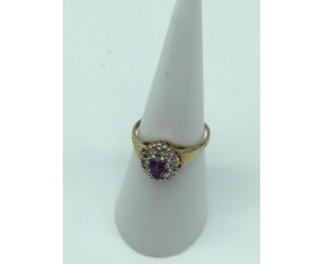 A 9ct gold ladies sapphire and diamond ring. Size L. 