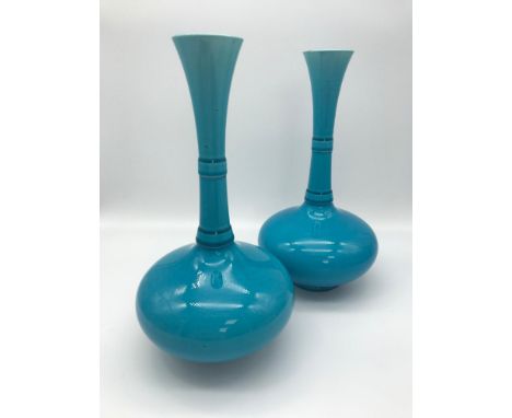 A Pair of 1890s Turquoise Burmantofts ceramic bottle neck vases. Stamped England &amp; White F to the base. Measure 24cm in h