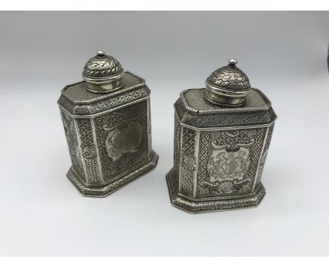 A Pair of Rare Georgian London silver tea caddies, Dated 1834, Makers Thomas Tookey, with highly intricate detailing througho