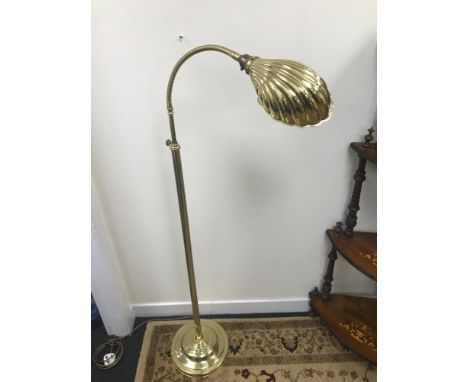 An Antique floor standing brass angle poise lamp. Working 