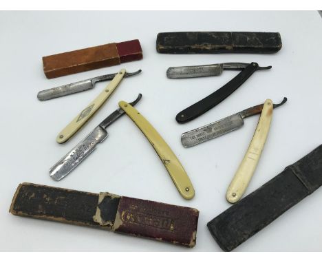 A lot of 4 vintage cut throat razors 