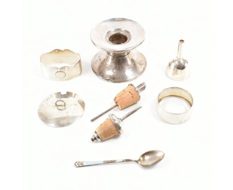 A collection of silver and white metal ware. To include a hallmarked silver napkin ring and 800 silver napkin ring, a Gorham 