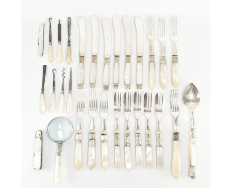 A collection of 19th 20th century mother of pearl handled cutlery and vanity implements. To include knives, forks a spoon, ma