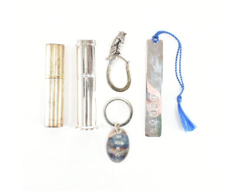 An assorted collection of hallmarked silver, together with white metal atomiser. The lot to include; A silver cased atomiser 