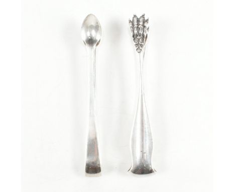 Two antique &amp; later hallmarked silver sugar tongs. The first of an undulating form with clawed lions feet, marked with Fr