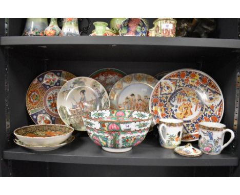 A collection of oriental plates, bowls,cups and similar.