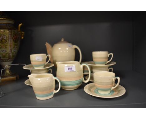 An art deco part tea service by Susie Cooper in the wedding band design