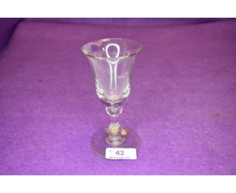 A deep bowl wine glass with two knops to stem.