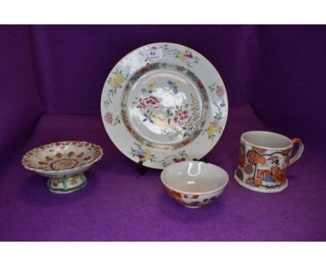 A selection of hard paste ceramics including a Japanese plate and incense stand with decorative enamel work and a similar iro