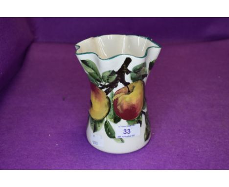 A vintage Wemyss vase having apple and foliage design.
repair to rim and small chip to rim.
approx 11.5cm accross neck and 14