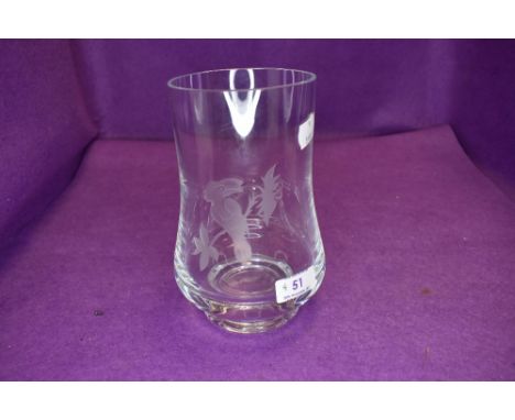 A modern clear cut crystal etched glass vase depicting a tucan bird signed LS 74 to base and standing at 18cm tall no chips o