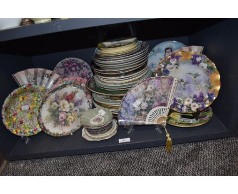 A selection of ceramic display and similar plates including ceramic fans