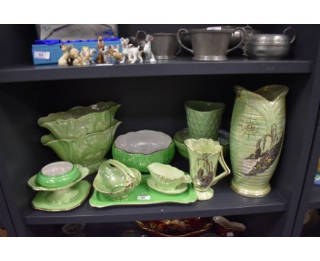 A selection of green glazed lustre ceramic by Arthur Wood from the Sylvan range