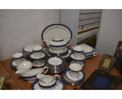 A part tea service by Aynsley in the Blue Mist design