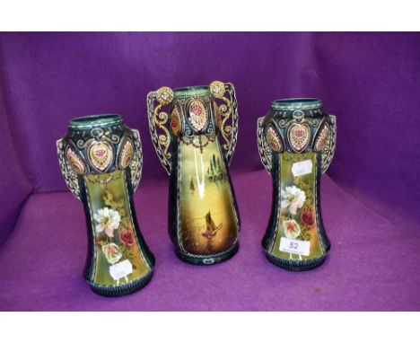 A ceramic mantle garniture set late Victorian