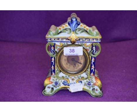 A vintage ceramic mantel clock having continental quimper styling and brass face with bevelled glass window.
untested,good co