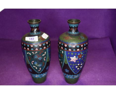 A pair of Japanese or similar cloisonne vase in green and blue hues
Good condition, one or two minute areas of wear to cloiso