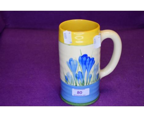An art deco Tankard by Clarice Cliff in the blue crocus design
Good condition, nominal age related wear to paint near base an