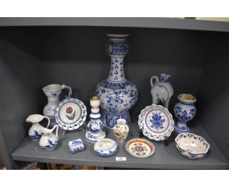 A selection of Dutch delft and similar style ceramics including large hand decorated tulip shape vase
slight crazing to some 