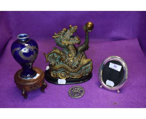 A mixed lot of items including oriental blue vase with dragon on wooden stand, figurine, brooch and more.