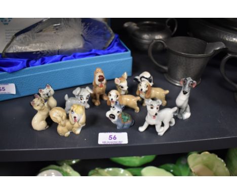 A selection of collectable figures by Wade from the Disney series