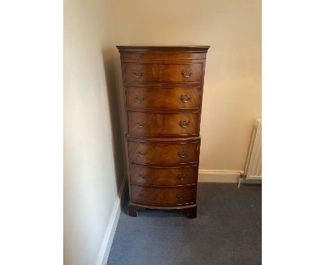 A chest of drawers in the style of a chest on chest (H132cm W55cm D41cm)