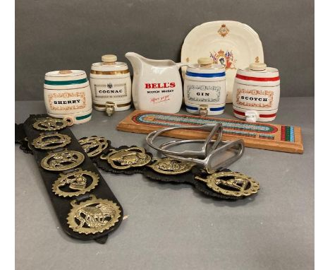 A selection of brewarania and decorative items to include A Bells scotch whiskey jug, various ceramic miniature spirit barrel