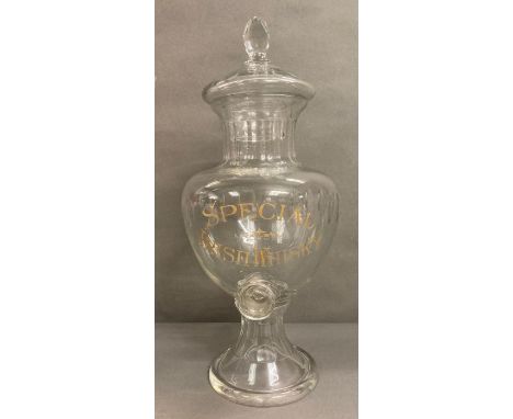 A large glass special Irish whisky dispenser/decanter with faceted lid on a flared circular foot (H63cm)
