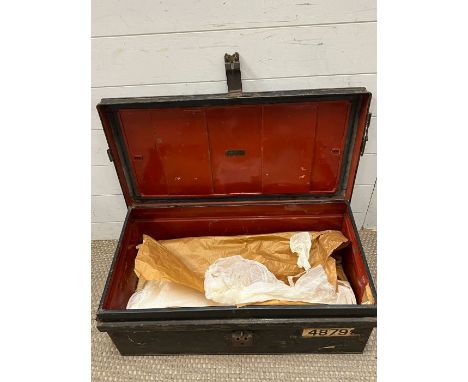A metal travel trunk 