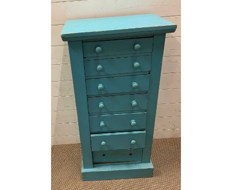 A painted pine tall boy consisting of seven drawers (H103cm W54cm)